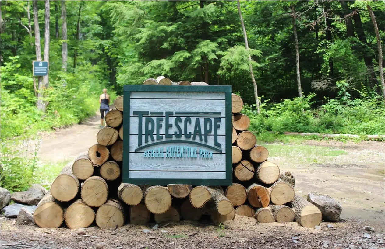 Entrance banner at TreEscape Aerial Adventure Park in Vernon, NJ, featuring the park’s logo and welcoming visitors to the adventure experience.