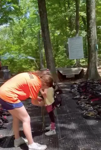 Kid preparing to launch on a zip line at TreEscape aerial adventure park in Vernon, NJ