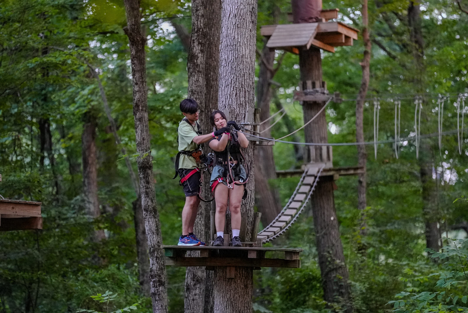 couple preparing for a ropes course experience at TreEscape Vernon NJ